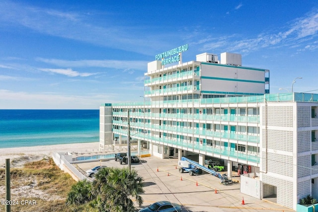 view of building exterior with a water view