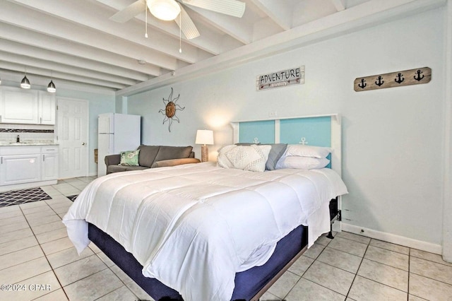 bedroom featuring sink, beam ceiling, ceiling fan, and light tile floors