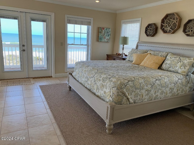 bedroom featuring light tile flooring, multiple windows, crown molding, and access to outside