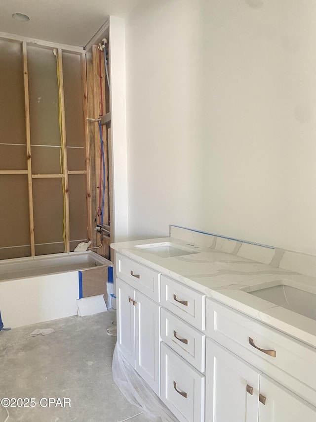 610 Shady Oaks Ln, Lynn Haven, FL 32444 - full bath featuring double vanity, a bathtub, and concrete floors