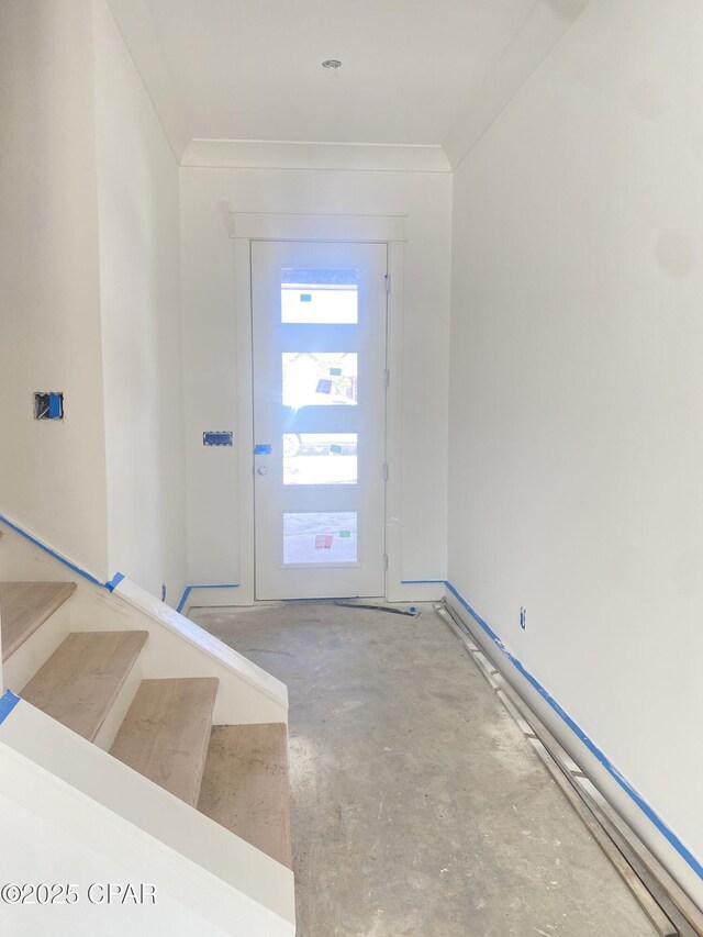 610 Shady Oaks Ln, Lynn Haven, FL 32444 - entrance foyer with stairs and unfinished concrete flooring