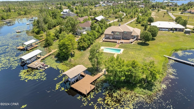 birds eye view of property featuring a water view