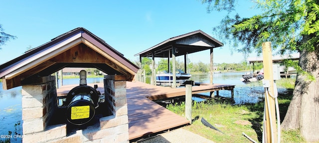 view of dock with a water view