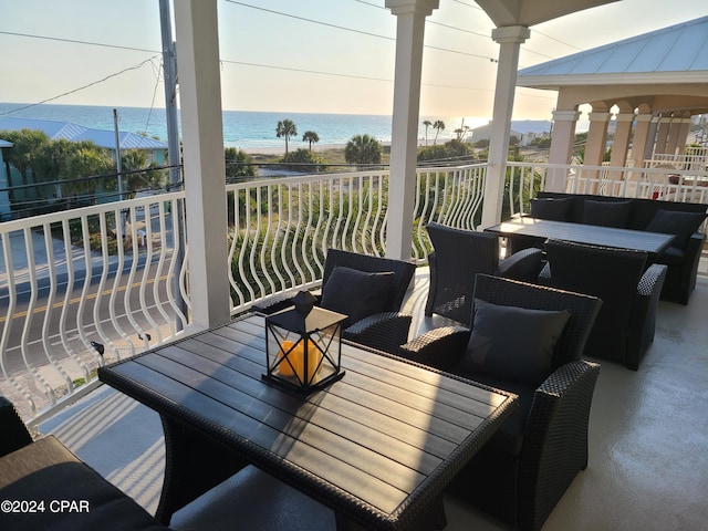 wooden deck with a water view