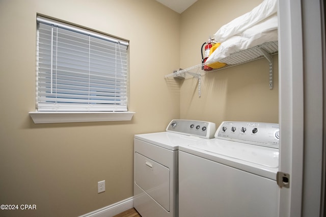 laundry room featuring independent washer and dryer