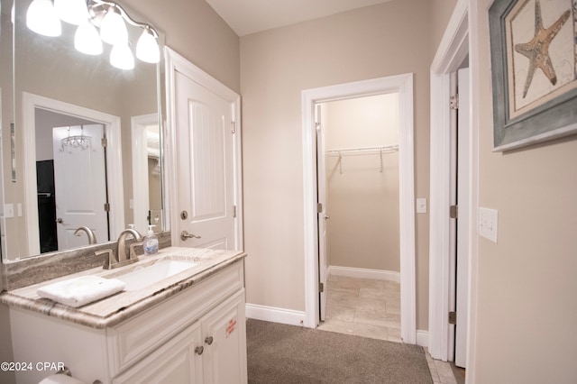 bathroom with tile flooring and oversized vanity