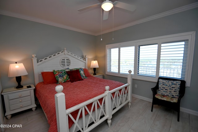 bedroom featuring ceiling fan and ornamental molding