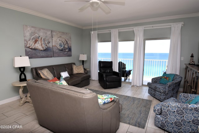 living room with ceiling fan, light tile patterned flooring, a water view, and crown molding