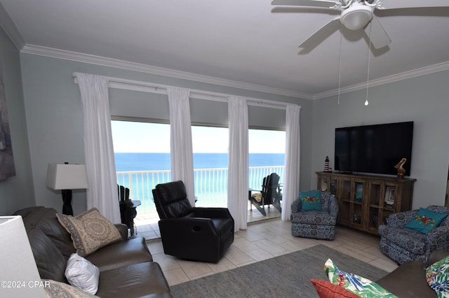 living room with ceiling fan, crown molding, and light tile patterned floors