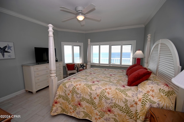 bedroom featuring ceiling fan, crown molding, and light hardwood / wood-style flooring