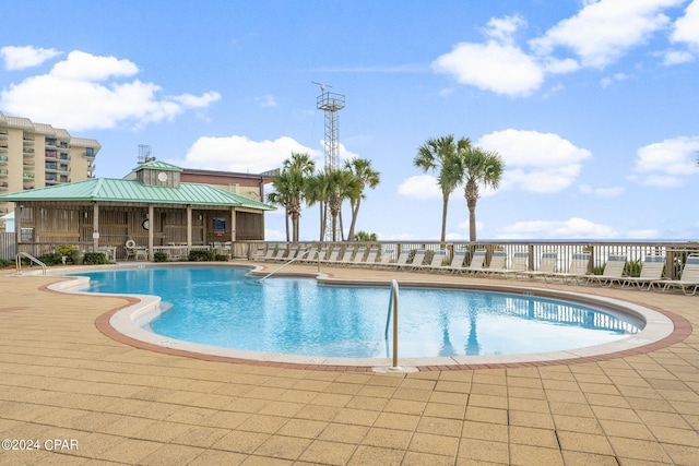 view of pool with a patio area