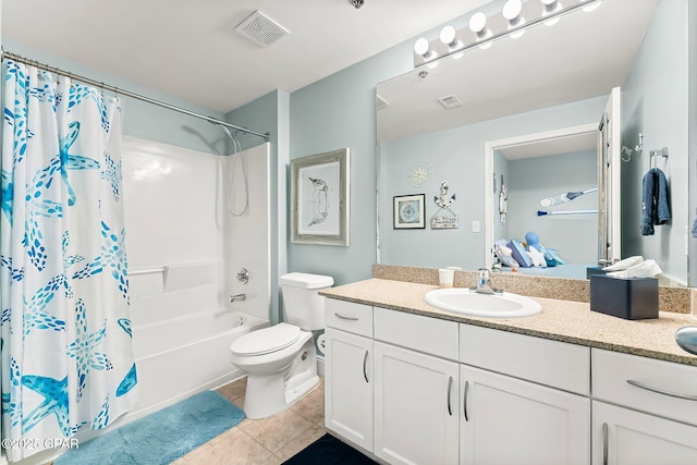 full bathroom with tile patterned floors, vanity, toilet, and shower / tub combo