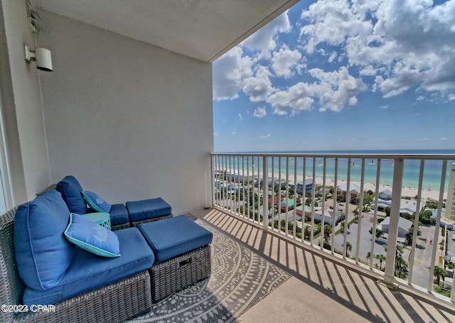 balcony with a view of the beach and a water view