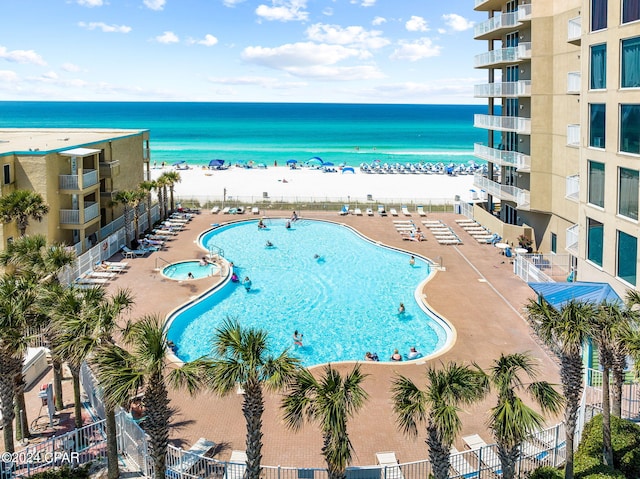 view of pool featuring a water view