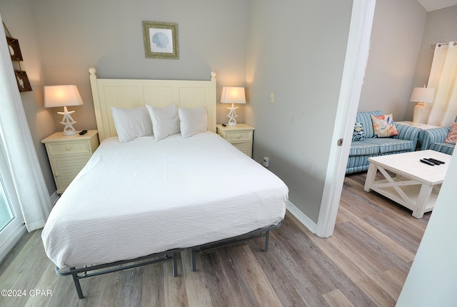 bedroom featuring light wood-type flooring