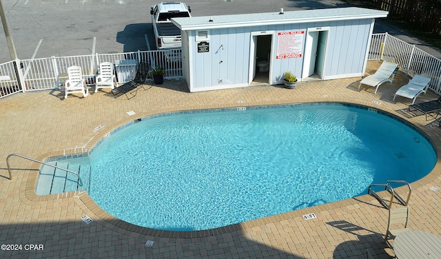 view of pool with a patio area