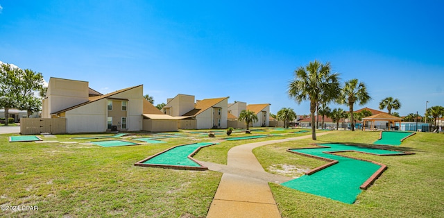 view of nearby features featuring a lawn