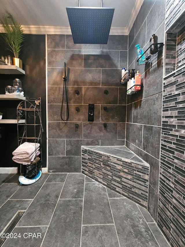 bathroom with tile patterned flooring, tile walls, and ornamental molding