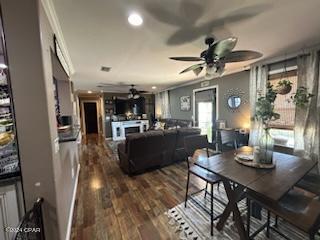 interior space with crown molding and hardwood / wood-style floors