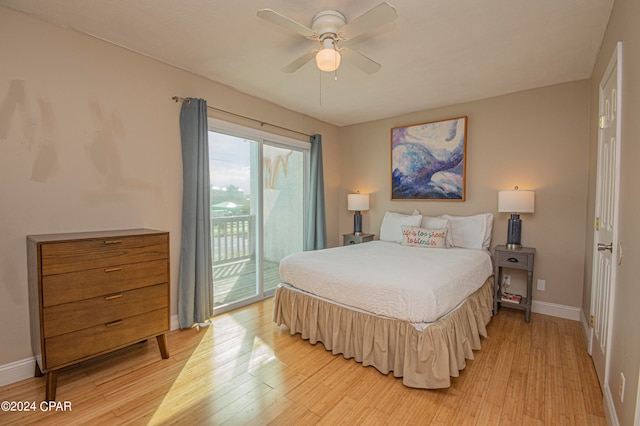 bedroom featuring ceiling fan, light wood-type flooring, and access to outside