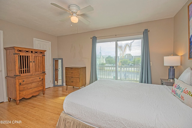 bedroom with ceiling fan, access to exterior, and light wood-type flooring