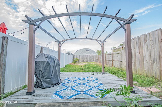 exterior space featuring a deck and a pergola