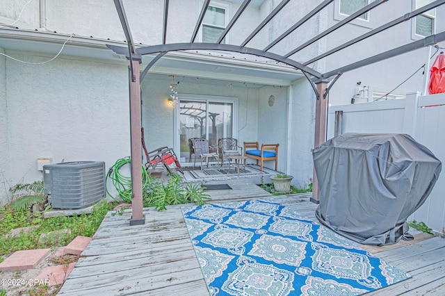 wooden terrace with central AC and grilling area