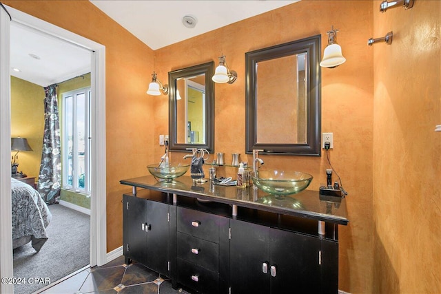 bathroom featuring vanity and tile patterned flooring