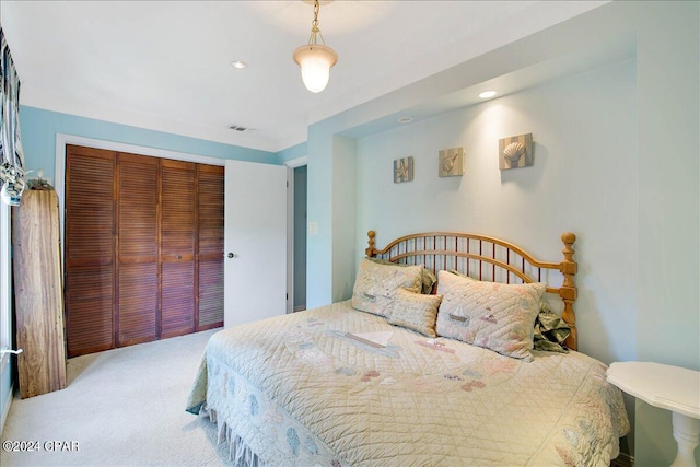 bedroom featuring a closet and carpet flooring