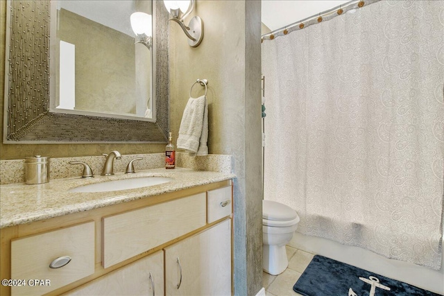 full bathroom with tile patterned flooring, shower / bath combination with curtain, vanity, and toilet