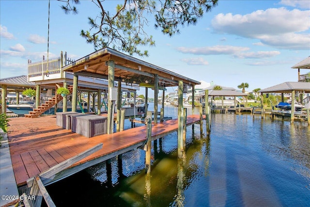 view of dock with a water view