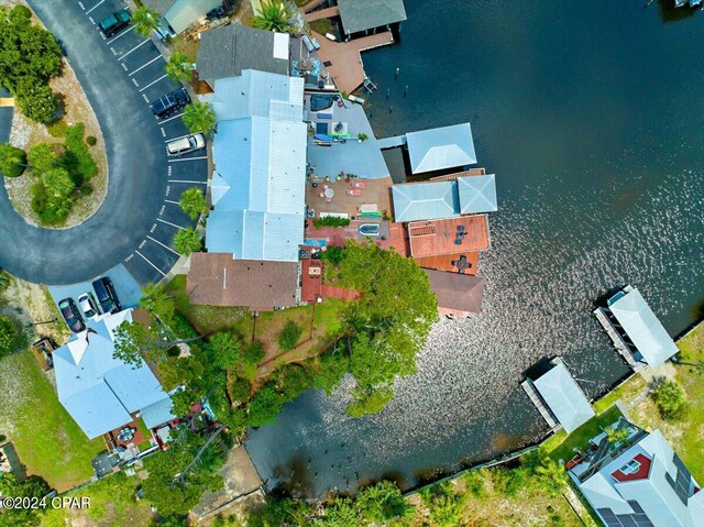 birds eye view of property featuring a water view