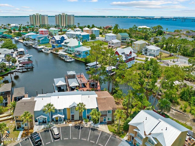 drone / aerial view with a water view