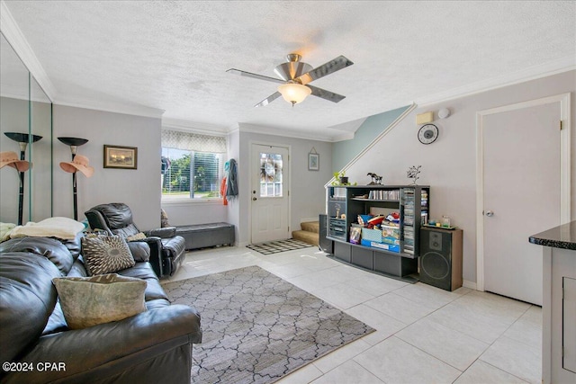 living room featuring a textured ceiling and crown molding