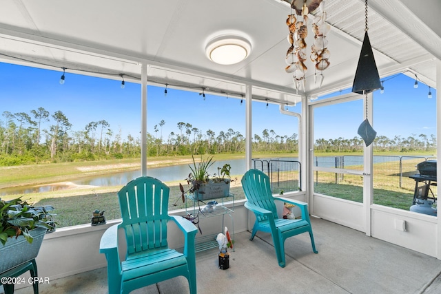 sunroom with a water view