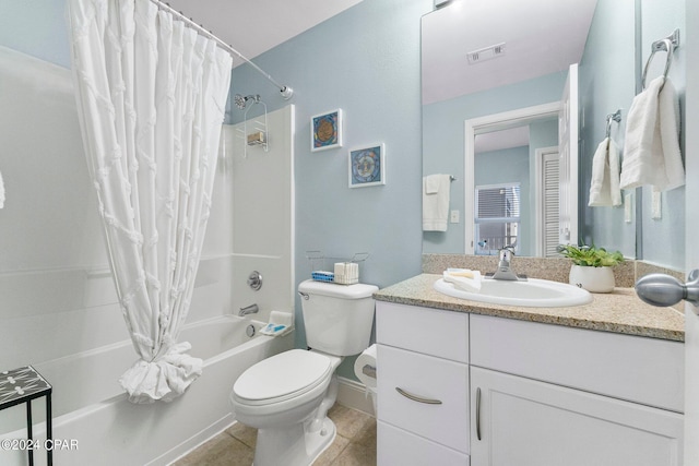 bathroom with toilet, vanity, visible vents, tile patterned floors, and shower / bath combo with shower curtain