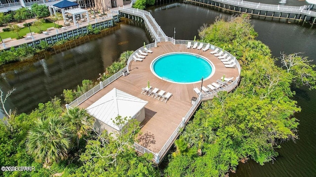 view of pool with a water view