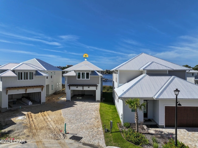 view of front of property featuring a garage