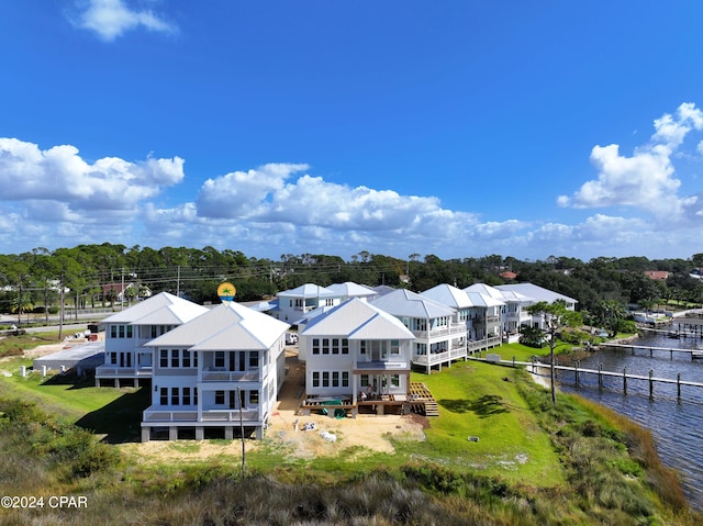 bird's eye view with a water view