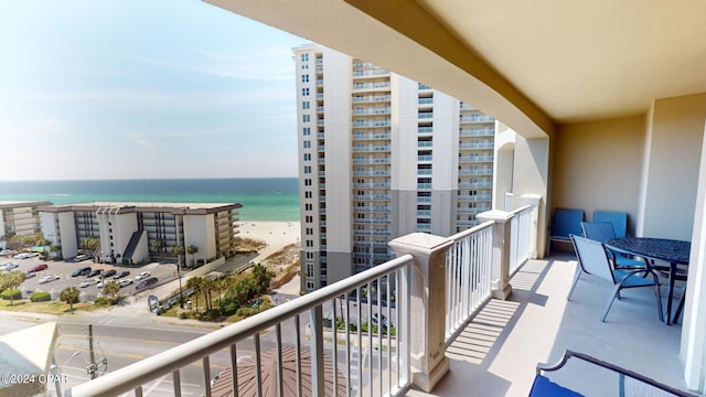 balcony featuring a water view