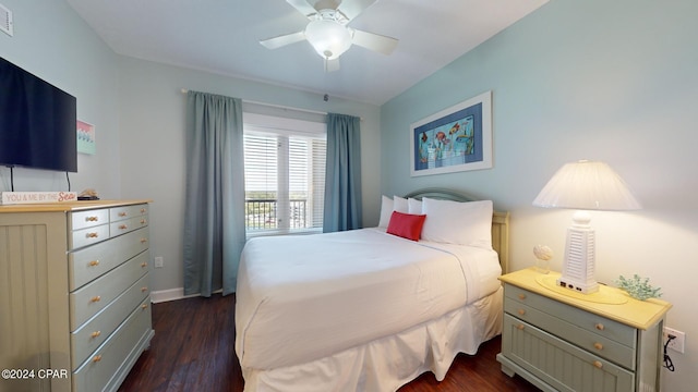 bedroom featuring dark wood-type flooring and ceiling fan