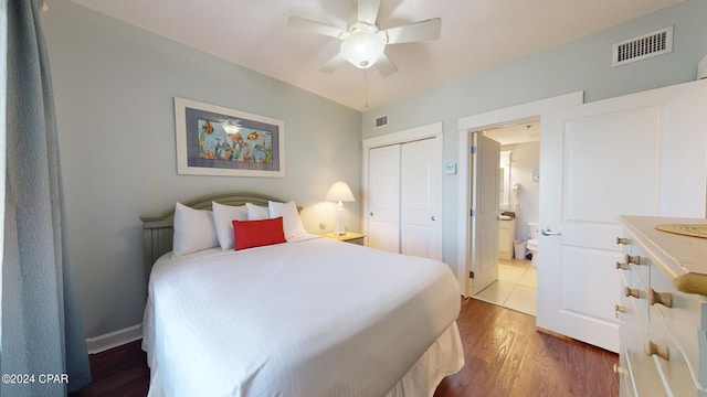 bedroom with ceiling fan, a closet, wood finished floors, and visible vents