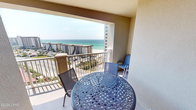 balcony featuring a water view