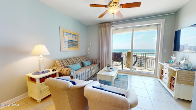11800 Front Beach Rd Unit 2-504, Panama City Beach, FL 32407 - living area featuring light tile patterned flooring, ceiling fan, and baseboards