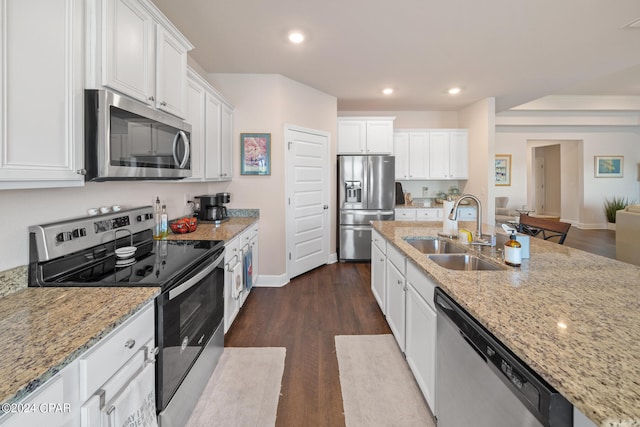 kitchen with white cabinetry, stainless steel appliances, dark hardwood / wood-style flooring, and sink