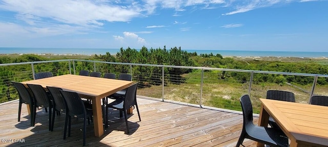 wooden terrace with a water view