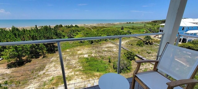 balcony featuring a water view