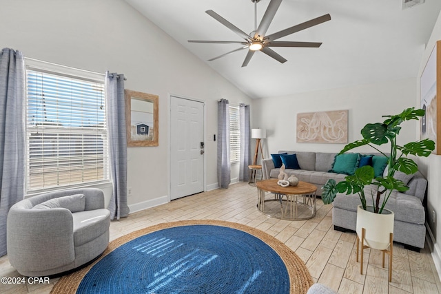 living room featuring ceiling fan, high vaulted ceiling, and a healthy amount of sunlight