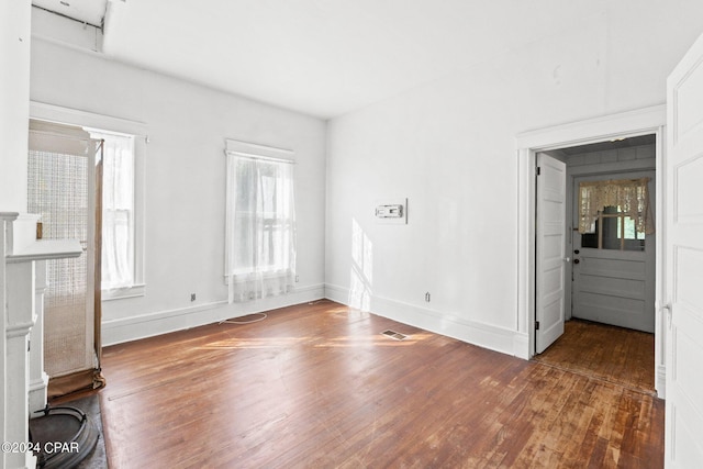 interior space with dark hardwood / wood-style flooring