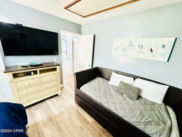 bedroom featuring light hardwood / wood-style floors